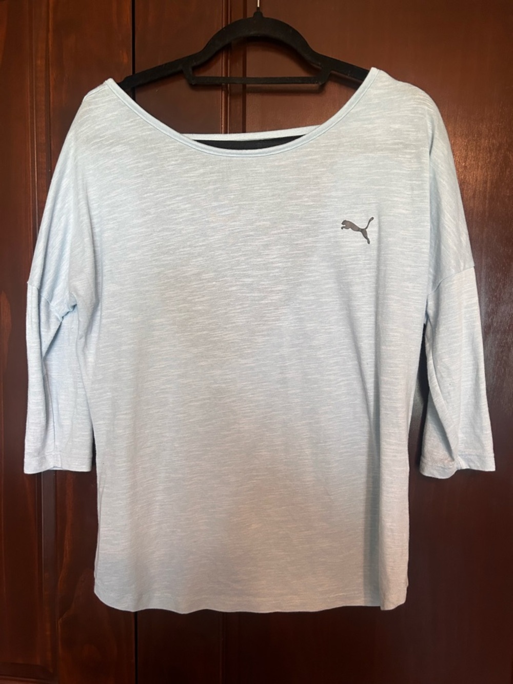 Puma Pale Blue Tee with Logo; cut out back